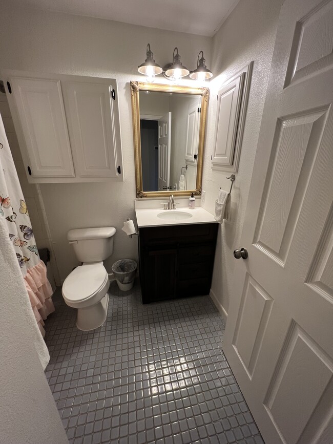 Guest bathroom with original tile - 5655 Larkdale Dr