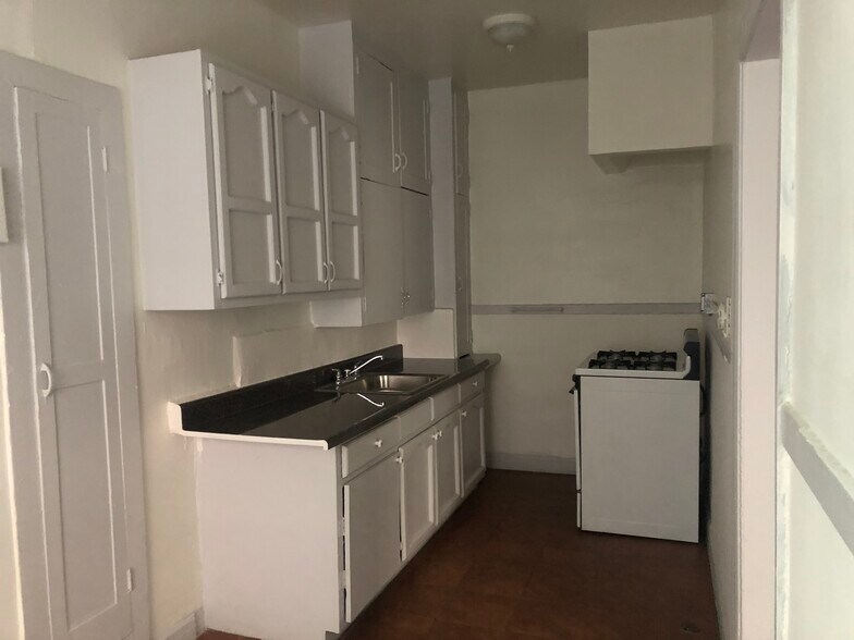 fridge and stove - 335 S Rampart Blvd