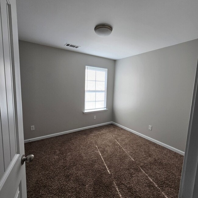 Building Photo - Two-Story Beauty in Olive Branch with Comp...