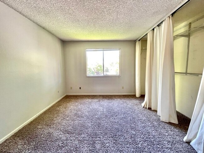 Building Photo - 2-Bedroom in Woodside Condos