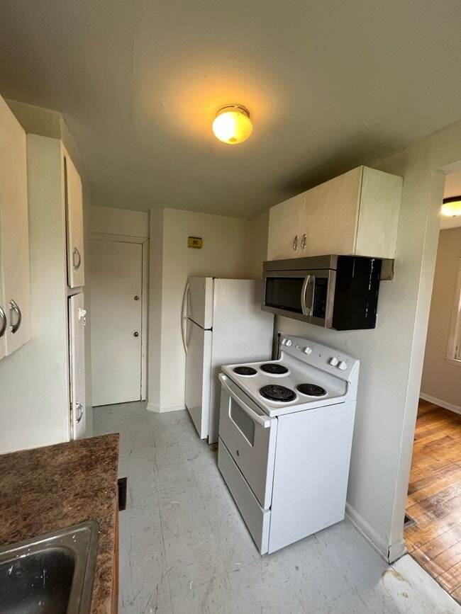 Building Photo - 1310-1312 E 25th Ave