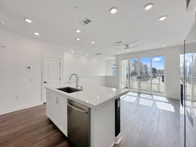 Building Photo - Luxury 3-Level Townhome for Rent | 2BR + 3BA | 1,500 Sq Ft with 2-Car Garage