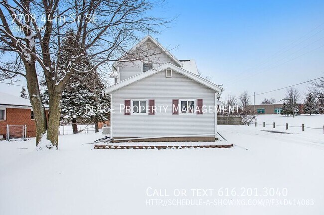 Building Photo - 2708 44th St Se - 2 Bed/1 Bath Upper Apart...