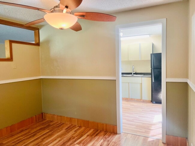 Building Photo - Charming 3BR/1BA w/ 1-car garage, long driveway, fenced yard, wood stove & shed/workshop.