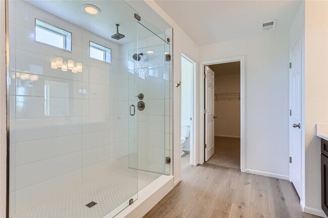 Building Photo - 3-Bedroom Home with Open Floor Plan, Private Balcony & Attached Garage