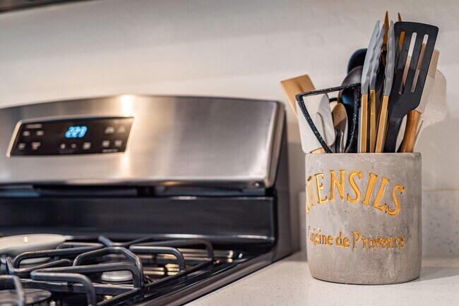 Building Photo - Furnished 3-bedroom, 2.5-bath townhome, designed to offer the ultimate in modern comfort.