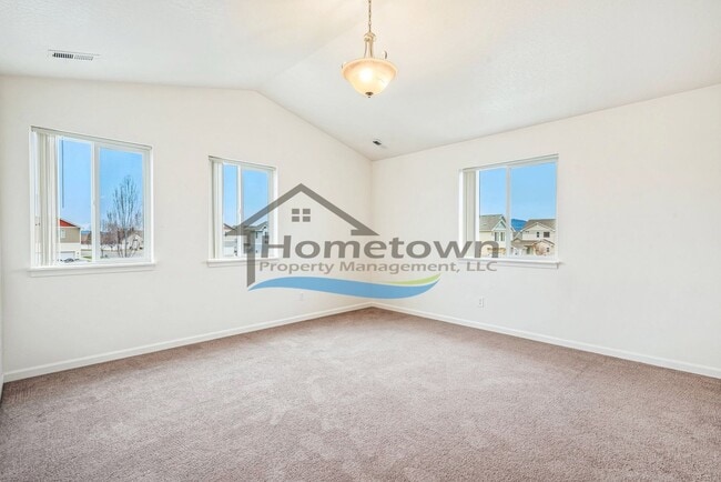 Building Photo - Townhouse Style Home with 3 Bedrooms, 2.5 Bathrooms, and a 2-Car Attached Garage Available in Coe...