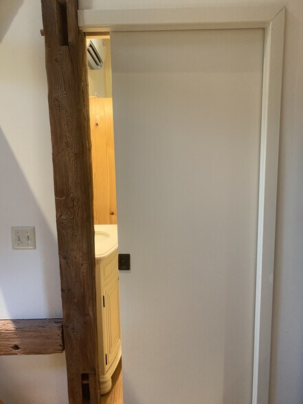 Pocket door to bathroom off of kitchen - 7098 FERRY Rd