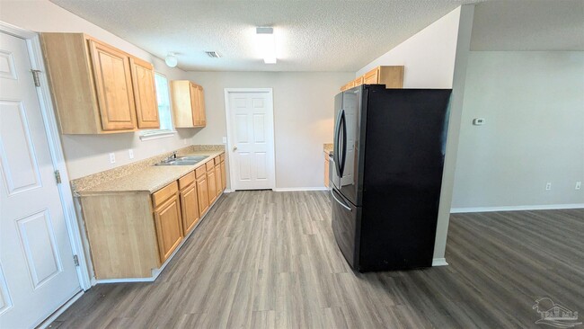 Building Photo - 8660 Figland Ave