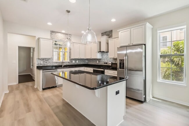 Building Photo - Beautiful 4/2.5 Townhome for Rent in Harmo...