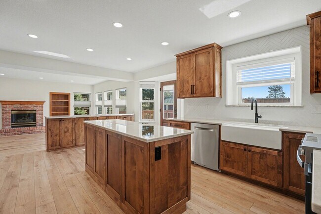 Building Photo - Backs to Open Space | Over 4,000 Sq Ft | Updated Kitchen + Solar