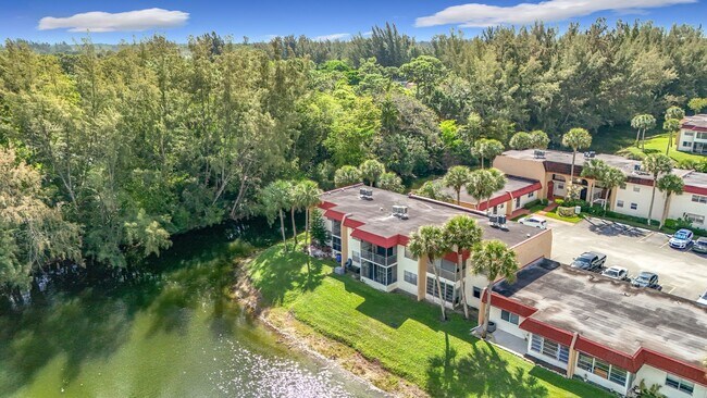 Building Photo - Desirable 55 plus community condo unit with a view of the lake on the 2nd Floor.