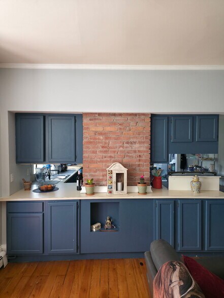 Dining room cabinet storage with kitchen view - 86 Holden St