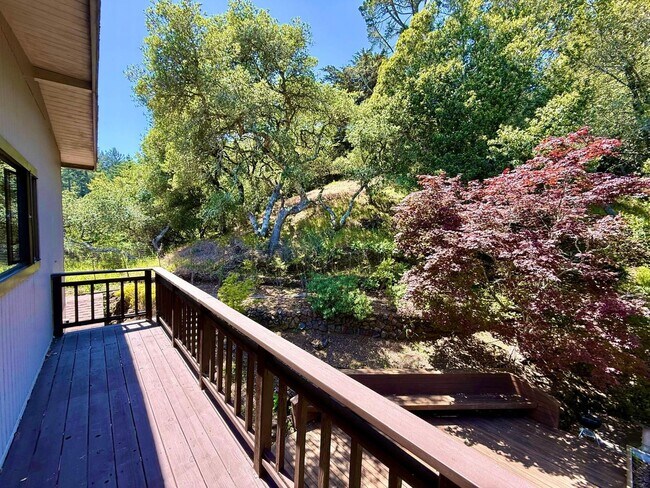 Building Photo - SPACIOUS THREE BED / THREE BATH HOME OFF OF PANORAMIC HWY WITH STUNNING VIEWS