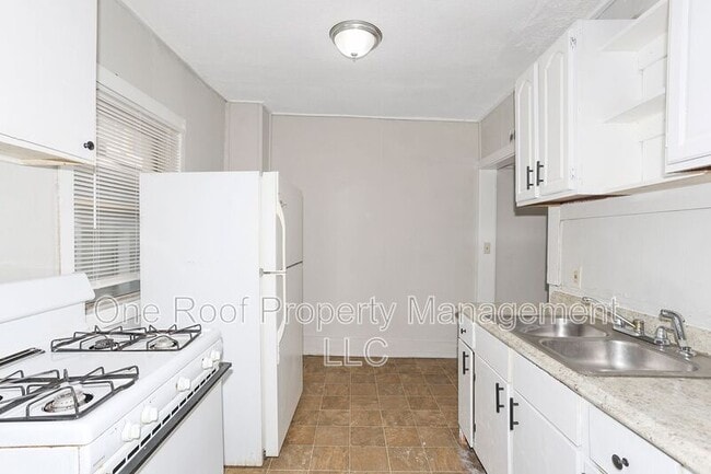 Building Photo - 3228-3230 E 8th St.