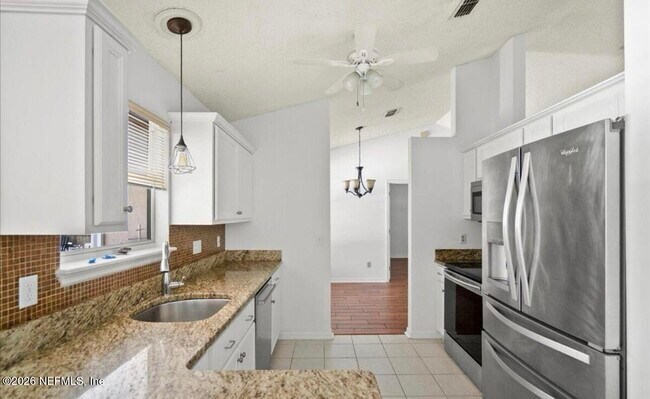Building Photo - 10334 Triple Crown Ave