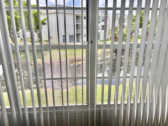 Building Photo - 8305 Sunrise Lakes Blvd