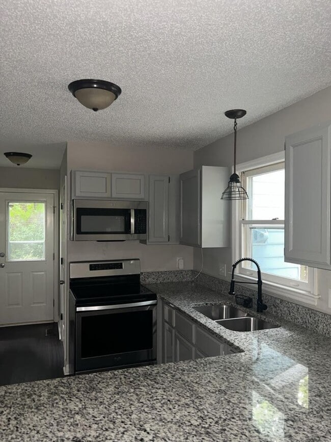 Building Photo - Coming Soon! 3 BR/2.5BA | Newly Renovated Single Family Home | Fenced yard | Community Amenities!