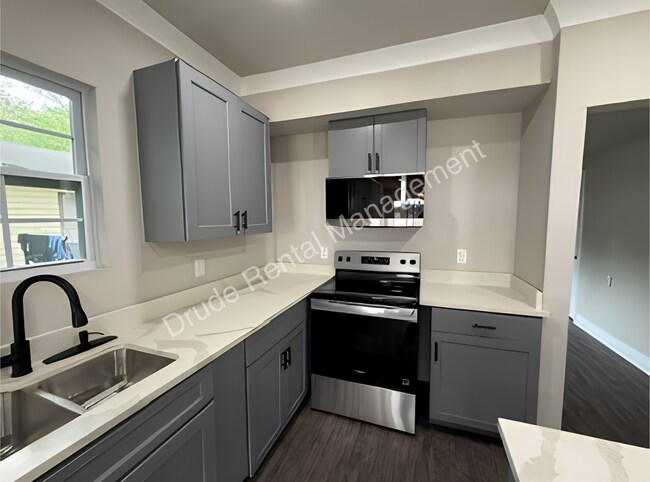 Building Photo - Remodel and Charming Home