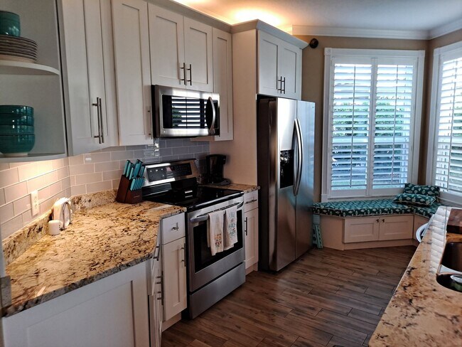 Building Photo - 3BR 2BA BOUCHELLE ISLAND GROUND FLOOR COND...
