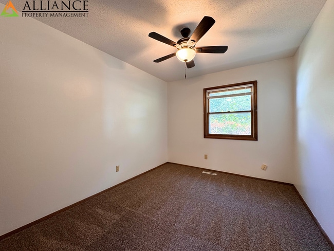 Building Photo - Home with Fenced Yard~Great West Side Loca...