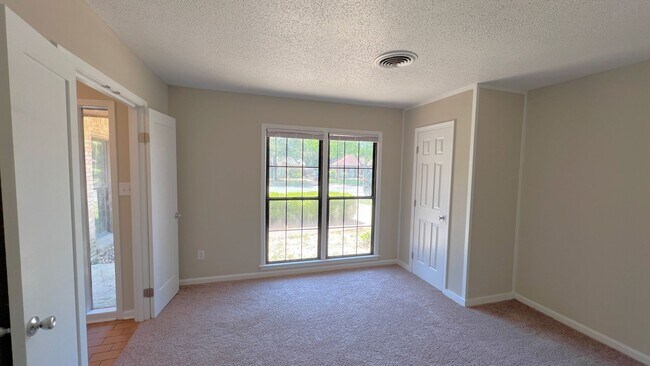 Building Photo - Beautiful 4-bedroom brick home