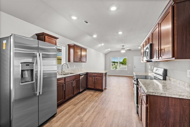 Building Photo - Charming Curb Appeal Meets Modern Comfort in the Monaco Plan!