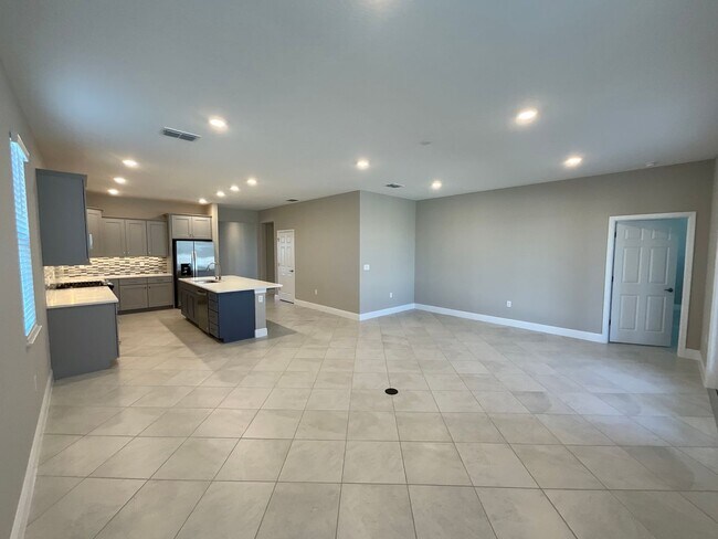 Building Photo - Brand New Home with all the upgrades in an all families community