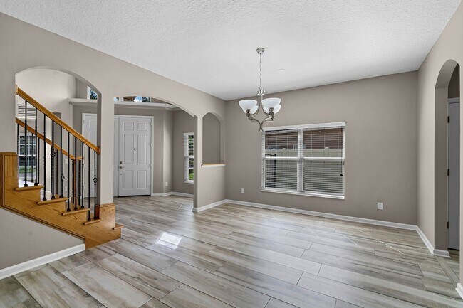 Building Photo - 4/2.5/2 Woodland Lakes Preserve Available Now
