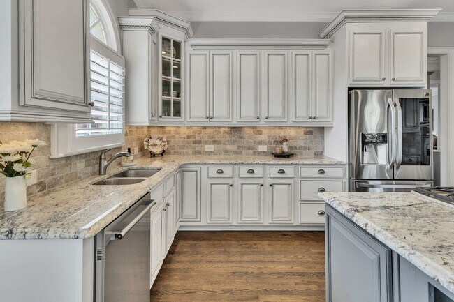Building Photo - Fully Furnished 4 Bedroom, 3.5 Bath w/ 3 Car Garage and Unfinished Basement in Governors Club