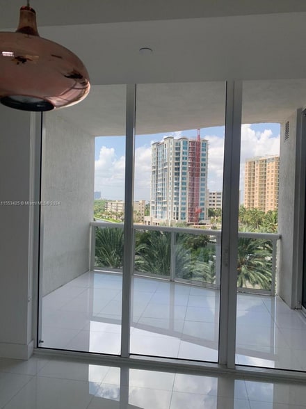 Building Photo - 15811 Collins Ave