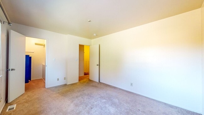 Building Photo - 2 story 2 bedroom 1 bath condo with covered parking, private storage and community pool!