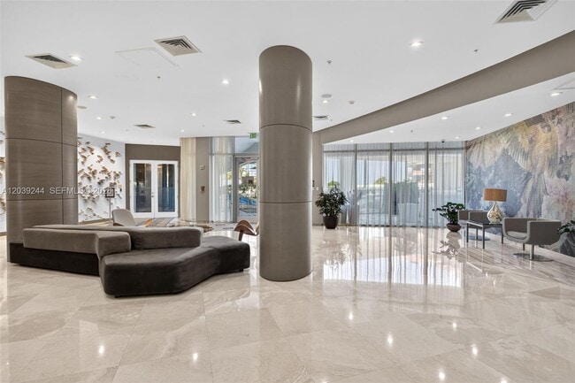 Building Photo - 10275 Collins Ave