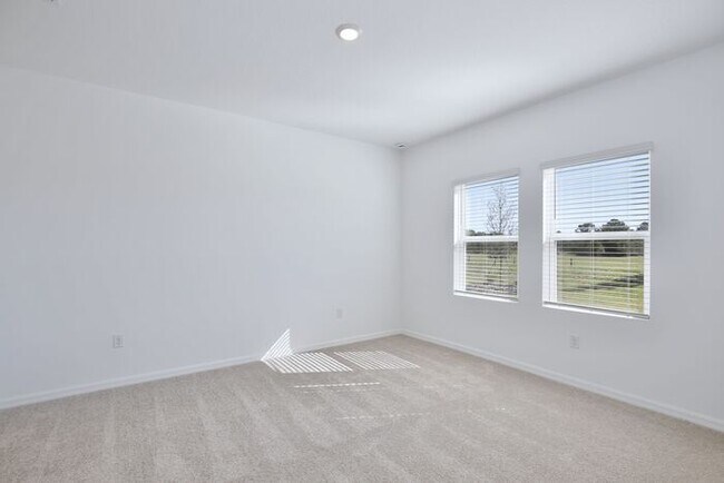 Building Photo - Stylish Sunbrooke Sanctuary! Modern 4/2 Ho...