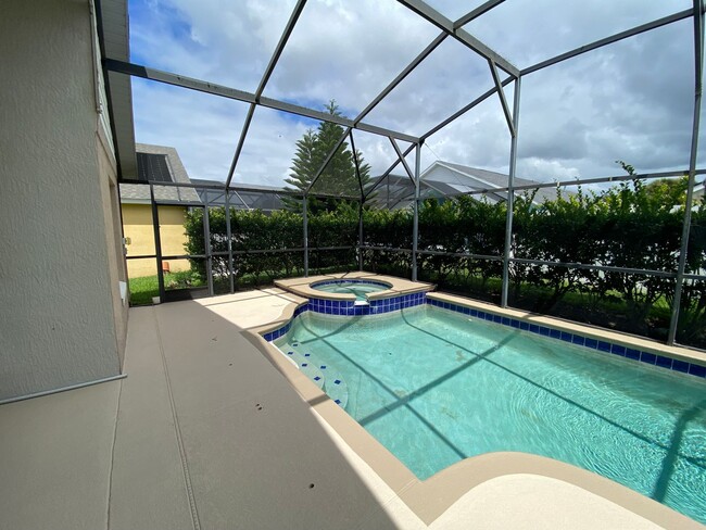 Building Photo - Great 4 Bedroom 3 Bathroom Pool Home in Indian Creek