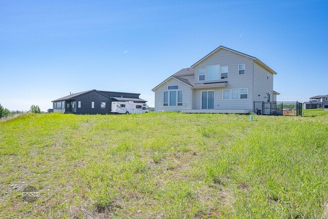 Building Photo - Premium 4BR Rental in The Ranch | Stunning Mountain Views | Easy Community Location | Automatic G...