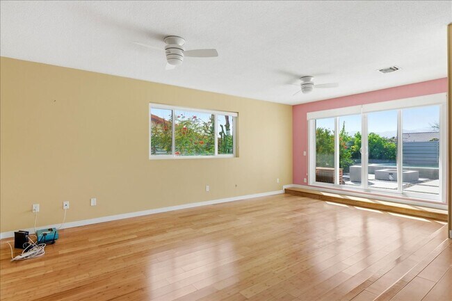 Building Photo - 3 bed / 2 Bath Mid-Century Home with Two-Car Garage, Soaking Pool and Manicured Backyard!