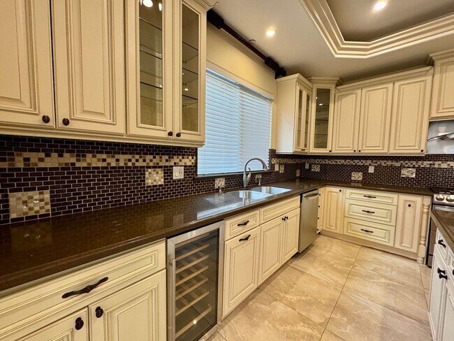 Building Photo - Peaceful North Hollywood street, charming three-bedroom, three-bathroom residence