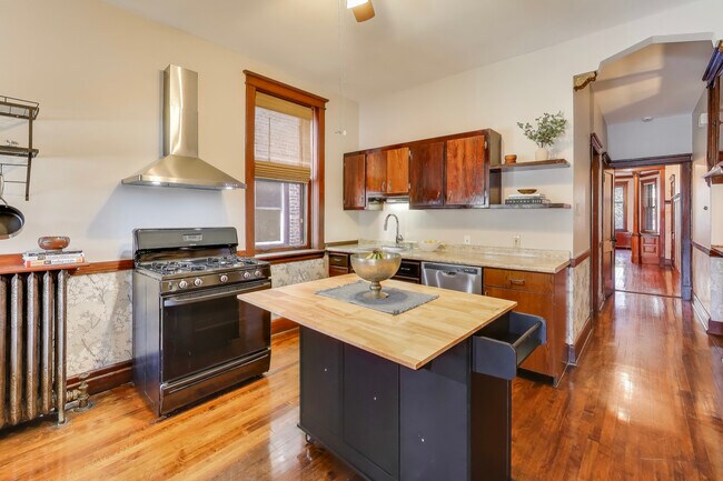 Building Photo - 6542 N Newgard Ave