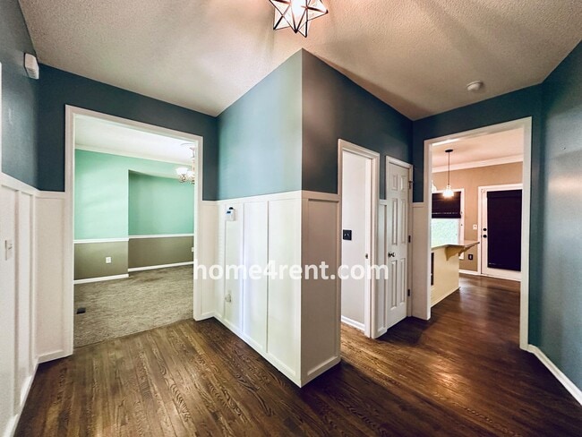 Building Photo - Blue Valley Schools w/ Wood Floors, Finished Basement and a Peaceful, Private Fenced Yard!