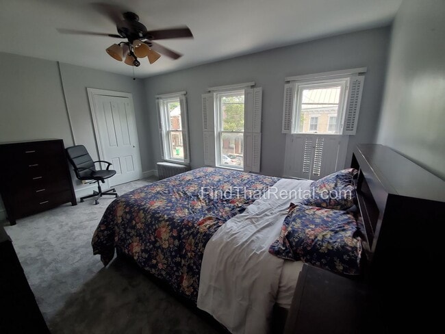 Building Photo - Charming Historic Retreat with Private Fenced Yard & Parking – Prime Downtown Location