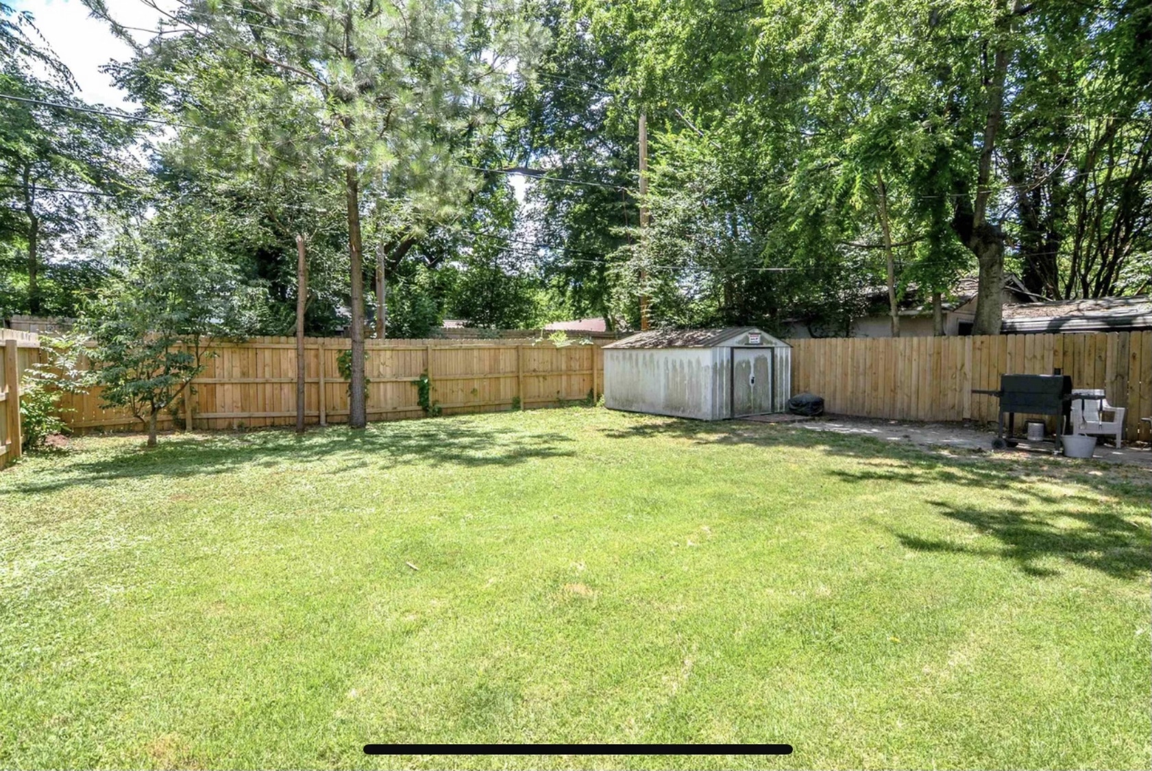 fenced in back yard with large shed (grill/chairs not included - 1939 Nelson Ave