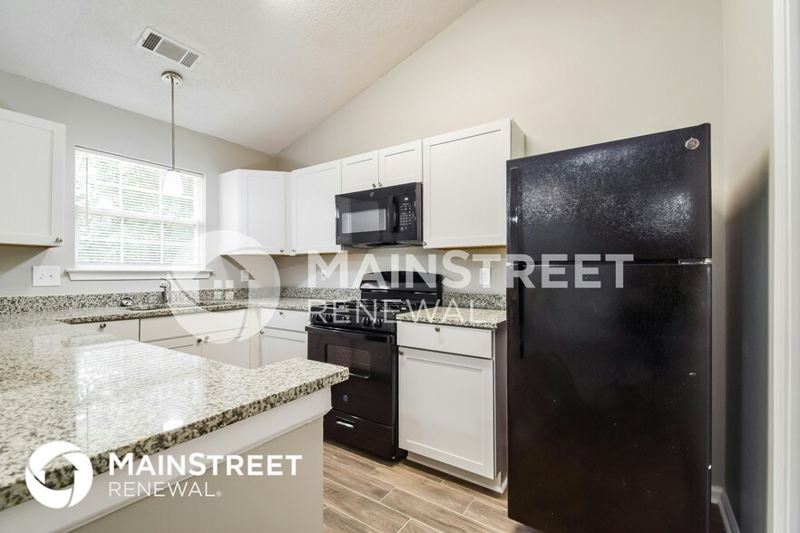 Building Photo - 9407 Rollinghills Dr