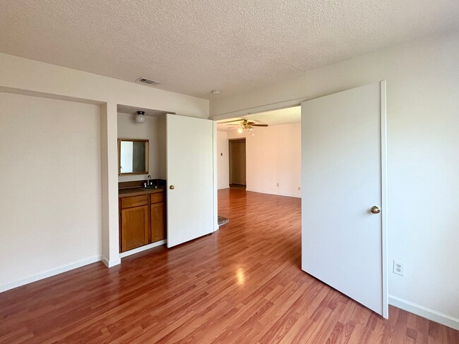 Building Photo - Move-In Ready Condo with Pool, Fireplace i...