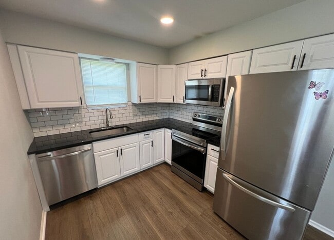 Building Photo - Coming Soon: Updated 3 Bedroom Duplex with...
