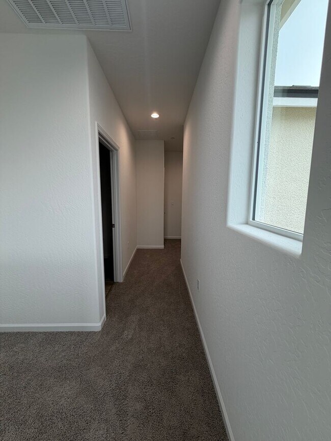 Building Photo - Spacious Brand New 4-Bedroom, 3-Bathroom Home with Solar & Low-Maintenance Yard