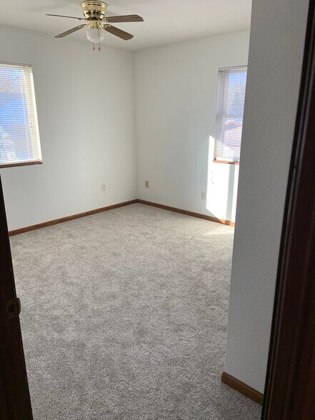 bedroom, brand new Bedroom 1, brand new carpeting and freshly painted walls. Bedroom has a closet - 20427 W Clark Ave