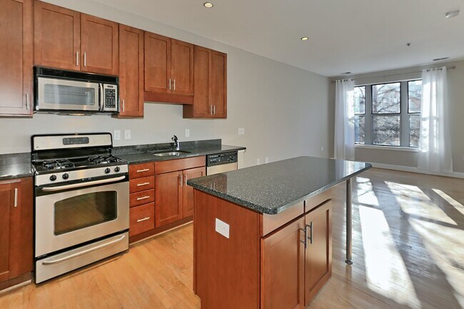 Building Photo - Unique Two-Level Condo