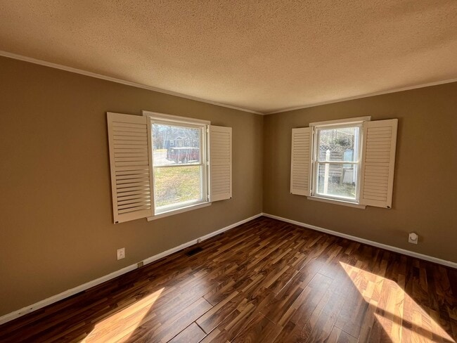 Building Photo - Cozy 1BD, 1BA Near Downtown Raleigh House with Fenced Yard