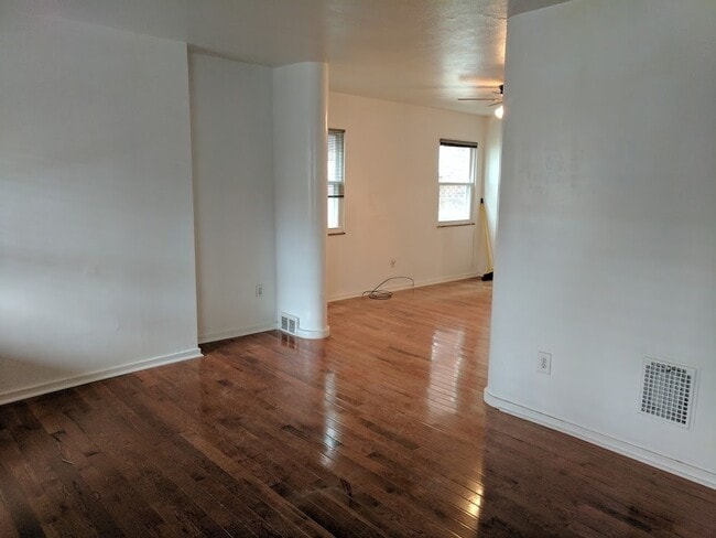 Building Photo - Check out this Totally Updated First Floor Duplex! 2BR+Den